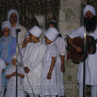 Livtar Singh singing with kids at KC in Florida in 1985-12