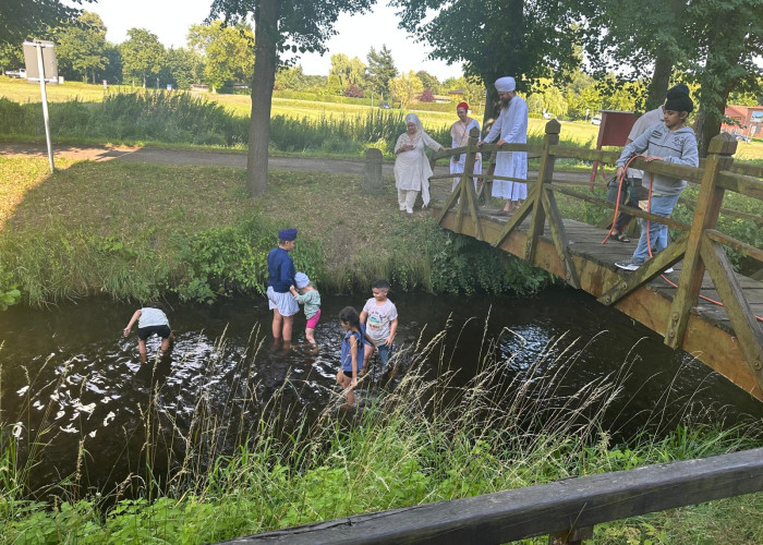 2026 German Smagam - kids playing on bridge-in water